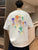 Jesse - Herren T-Shirt aus Baumwolle mit bunten Sternen und Grafikdruck